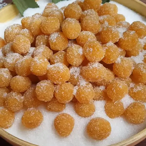 Cách làm Cách làm mứt thơm dẻo viên tròn cực đơn giản, ăn nhâm nhi ngày Tết Hình ảnh món Cách làm mứt thơm dẻo viên tròn cực đơn giản, ăn nhâm nhi ngày Tết - Công thức nấu ăn chi tiết